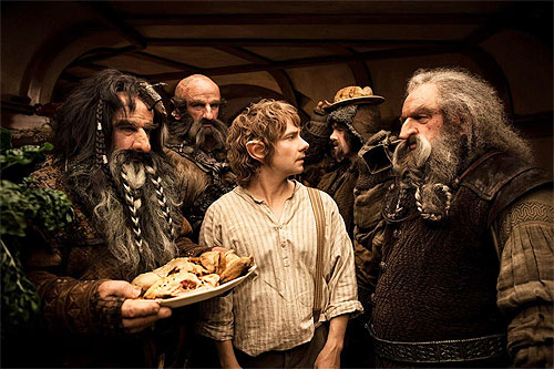 Bifur, Dwalin, Bilbo, Bofur, and Oin in Bag End